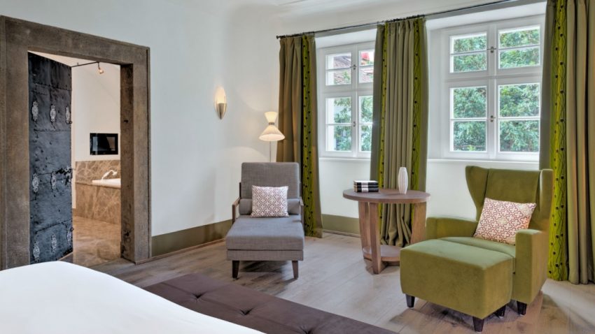 Praga Augustine hotel suite ancient door - The Style Lovers